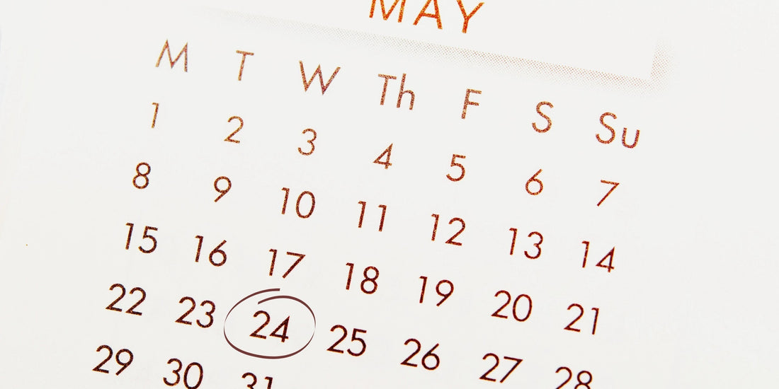 Alt text: Calendário do mês de maio com o dia 24 circulado, data do Dia Nacional do Café